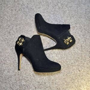 New black Vince Caputo boot heels